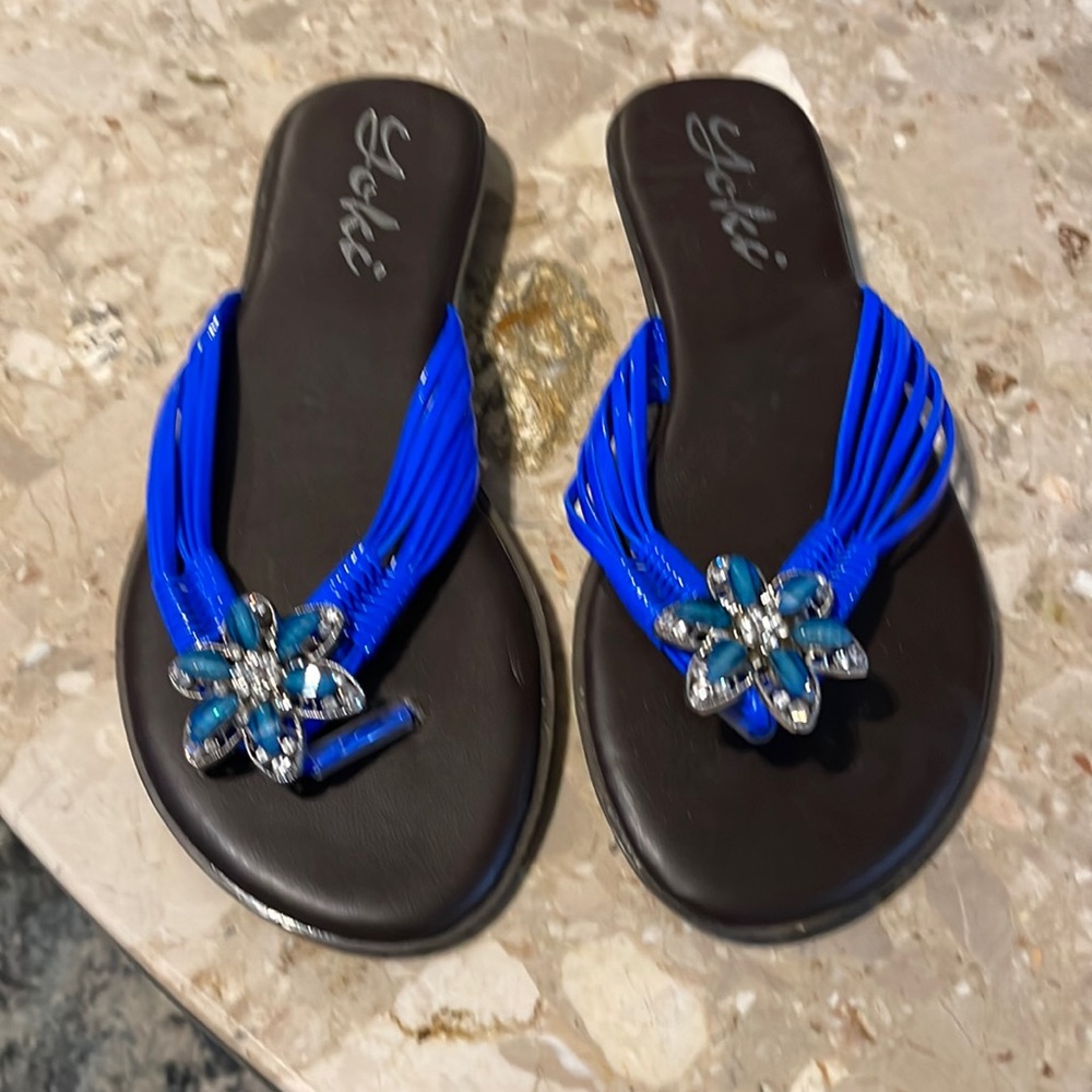 Women sandals size of blue with flour brand new
